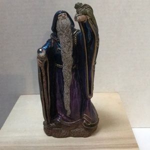 Wizard w/dragon by PENA. 7” tall. Peacock colors.
